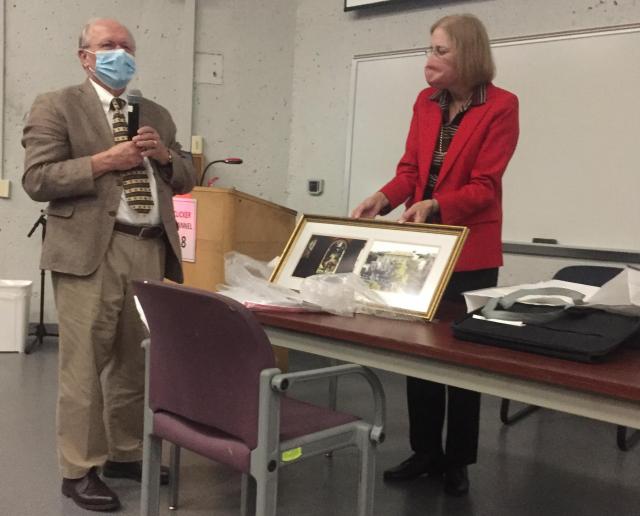 Lillian Doherty presents the Department’s gift to Professor Staley